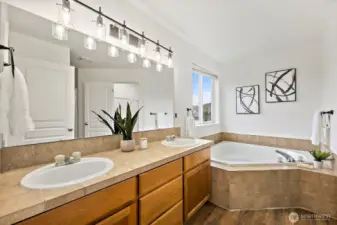 Double sinks and tile countertops, new lights