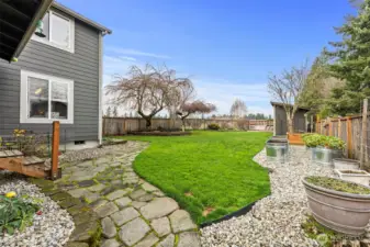 Large, fully fenced backyard with room for all of your hobbies!