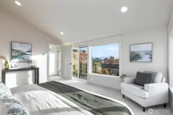 Primary bedroom on the top floor has great views of the Puget Sound and Mt Rainier.   Notice Deck is accessed both from the bedroom and the top of the staircase.