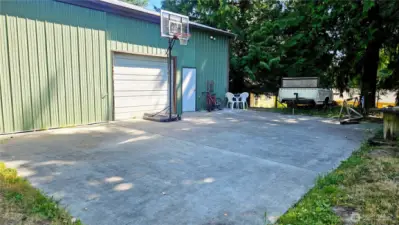 Approx. 1,000 sq. ft. shop, sliding and regular garage doors.