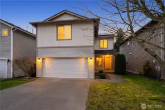 Front exterior with updated roof installed in 2024.