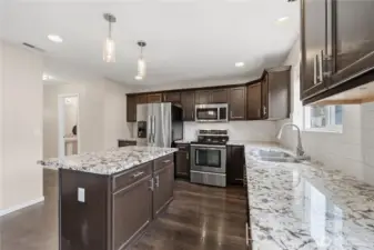 Stainless appliances complement the modern design.