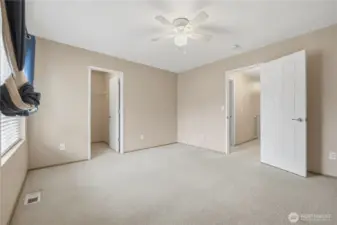 Secondary bedroom with flexible use options.