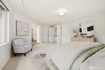 Large primary bedroom with room for a sitting area