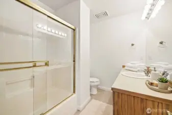 Upstairs full bathroom serving the secondary bedrooms