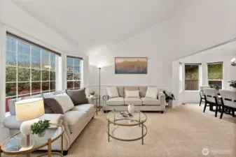 Formal living room with ample lighting and new paint