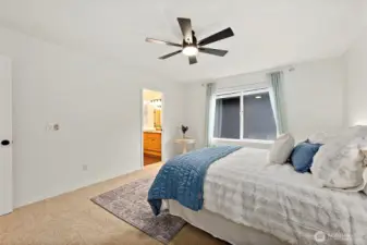 Primary bedroom with attached five piece bathroom