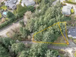 Triangular area nearest the house is the approximate portion of the vacant lot that will be removed through BLA prior to closing.   Lines are approximated, buyer to verify to own satisfaction.