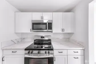 Brand new cabinets & upgraded appliances & countertops