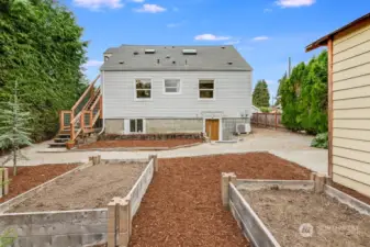 Backyard with entertaining space and garden areas