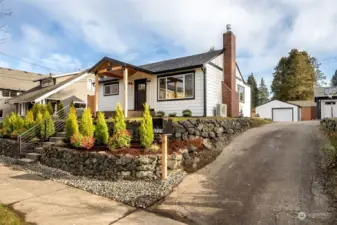 There is extra off-street parking, parking in the garage and even more parking off the street, in front of the garage, through the shared driveway.