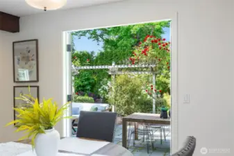 Enjoy your mornings looking out at the  beautifully manicured backyard