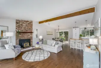 Open & bright living room with vaulted ceilings