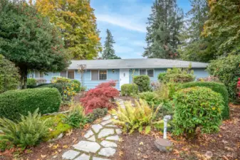 You will love the mature landscaping that welcomes you to the home - the front yard blooms from early March through October