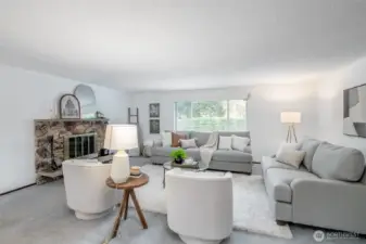 You will love this spacious living room framed by large double-pane windows