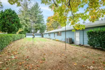 This lovingly maintained yard is complete with sprinklers