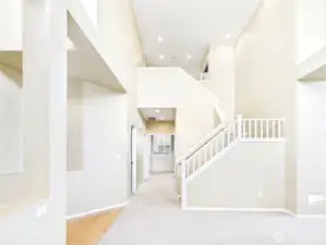 Entry and stairs to more living.