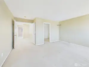 Ensuite bedroom with walk-in closet