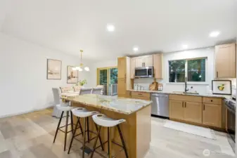 Elegant eat-in kitchen with entertaining island