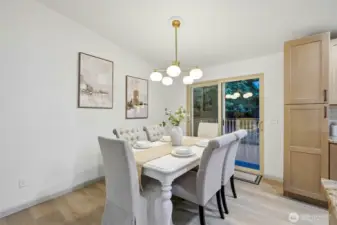 Comfortable dining room with large step-out deck to private deck leading to the backyard