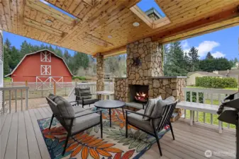 Top Quality Outdoor Living Space! Custom Built with Skylights and Cozy Gas Fireplace!! Enjoy Game Day or an Evening Movie...complete with Surround Sound! Natural Gas plumbed for the BBQ. Truly an Enjoyable Space!