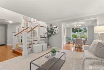 View of the formal living room, perfectly situated adjacent to the dining room for easy entertaining and flow.