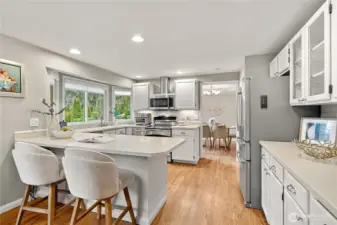 Eating Space in the Kitchen and a Bay Window looking onto the Outdoor Living Space.