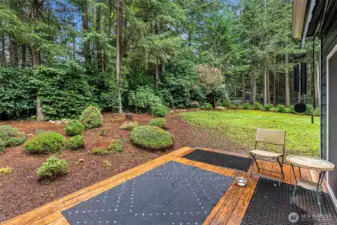 Deck off of the kitchen leads to fully fenced backyard