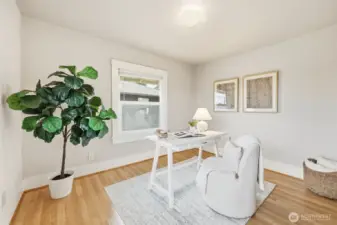Fourth Bedroom/Flex space.  These two bedrooms could be combined to make a great primary suite.  The hall bath is adjacent to the back bedroom for access to plumbing for a primary bath.