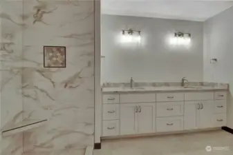 This beautiful layout is versatile and spacious. Mirrors have been installed and completed the space.