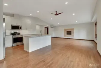 Spacious open concept! Custom kitchen with a propane fireplace waiting for you to add a your charm.