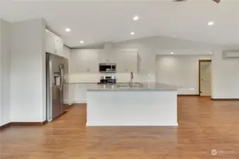 Convenient kitchen with U shaped layout. You can see the 2nd bedroom door to the right.