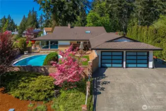 Frosted glass doors give this new garage a mid century vibe