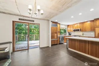 Dining area with sliding glass door leading out to deck