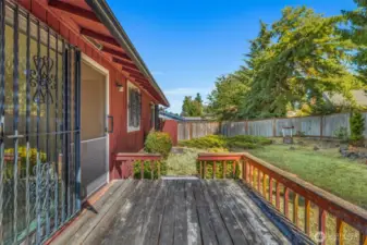 The back deck is off the dining room.