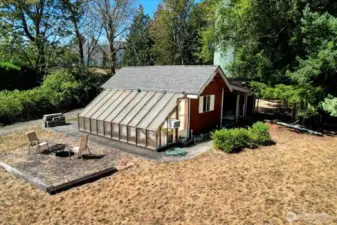 Greenhouse with attached shed and lean-to