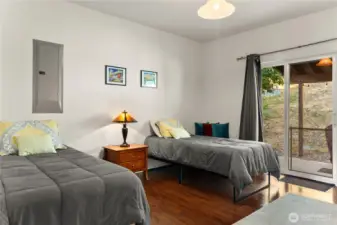 Enjoy the view of the backyard from this main floor bedroom with ensuite and walk-in closet.