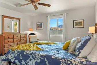Enjoy stunning mountain views through the large window in the upstairs bedroom.