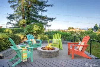 There's a stunning full view of Mount Rainier from here just to the right of this photo. Relax around your firepit or entertain friends, there's plenty of room for everyone here.