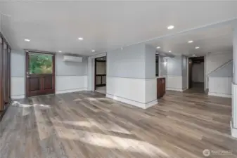 Here's the flex room downstairs, all of the windows and doors have top down/bottom up blinds, with a 3/4 bath to the right of this photo.