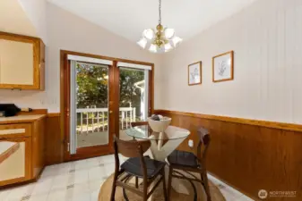 French doors lead out to deck, amazing yard and HUGE shop.