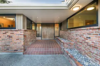 A warm and welcoming courtyard invites you inside this serene Broadview haven.