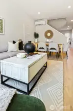 Photos of model home 9752 with similar finishes & floor plan. The living space's details are curated—from textures and colors to layout and flow.