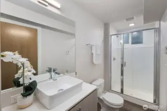 Guest bathroom with shower.