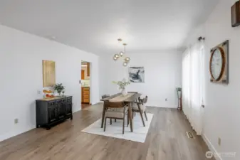 Formal dining offers additional space for larger tables if necessary.