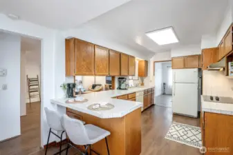 Kitchen is semi-open to informal/bonus room.