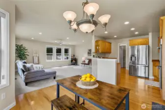 Kitchen eating area opens to kitchen and family room