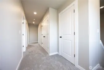 Linen closet and washer and dryer closet upstairs