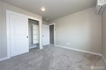 Closet in bedroom #1 has quality built-in shelves