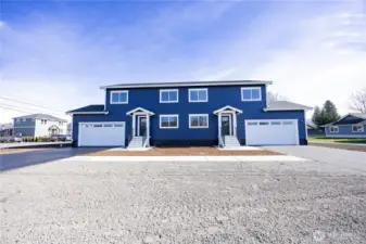 2-Unit condo complex. Gravel area is shared extra parking spaces